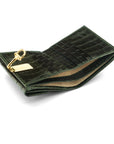 Leather purse with brass clasp, green croc, inside