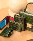 Leather squeeze spring coin purse, green croc, lifestyle