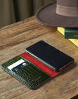 Leather iPhone 11 Pro wallet case, green croc, lifestyle