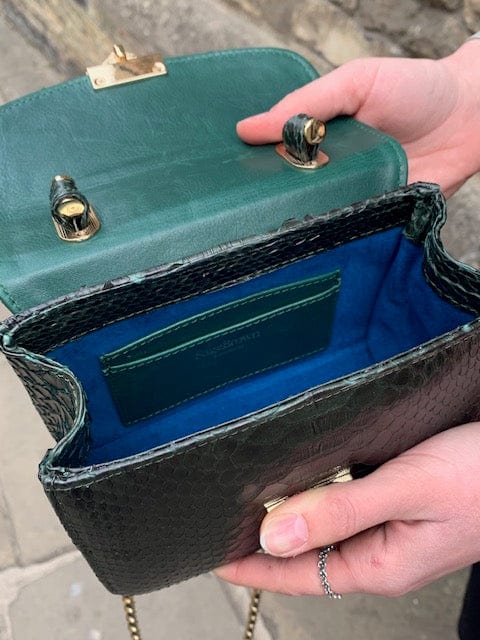 Small real python top handle bag, green, inside