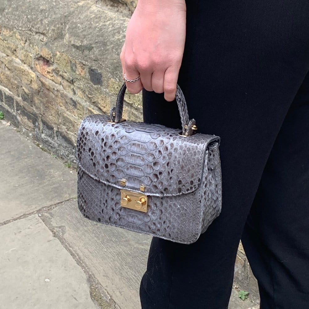 Small real python top handle bag, grey, lifestyle