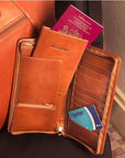 Luxury leather passport cover, tan, lifestyle