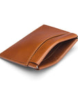 Leather squeeze spring coin purse, havana tan, open