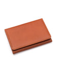 Leather tri-fold travel card holder, havana tan with green, front