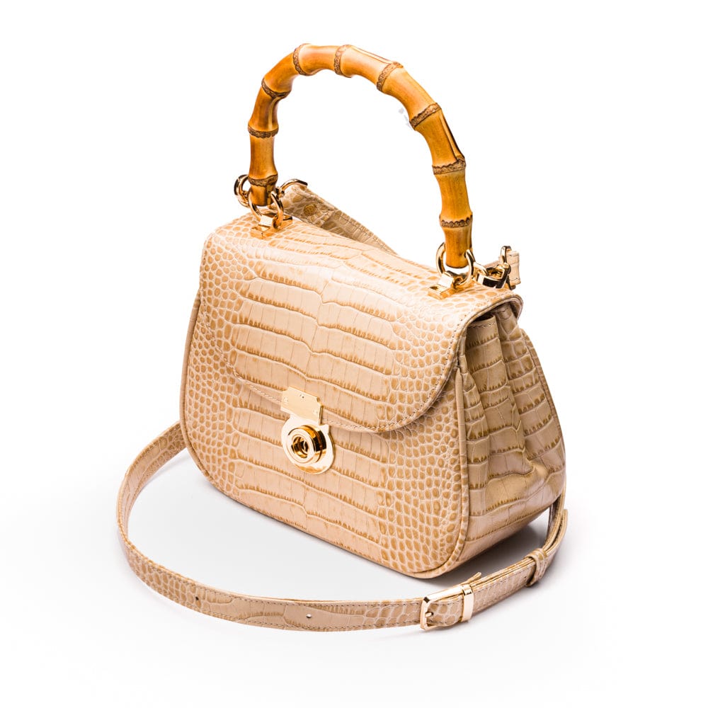 Bamboo handle bag, ivory croc, shoulder strap view