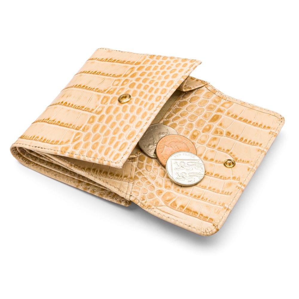 Leather purse with brass clasp, ivory croc, open