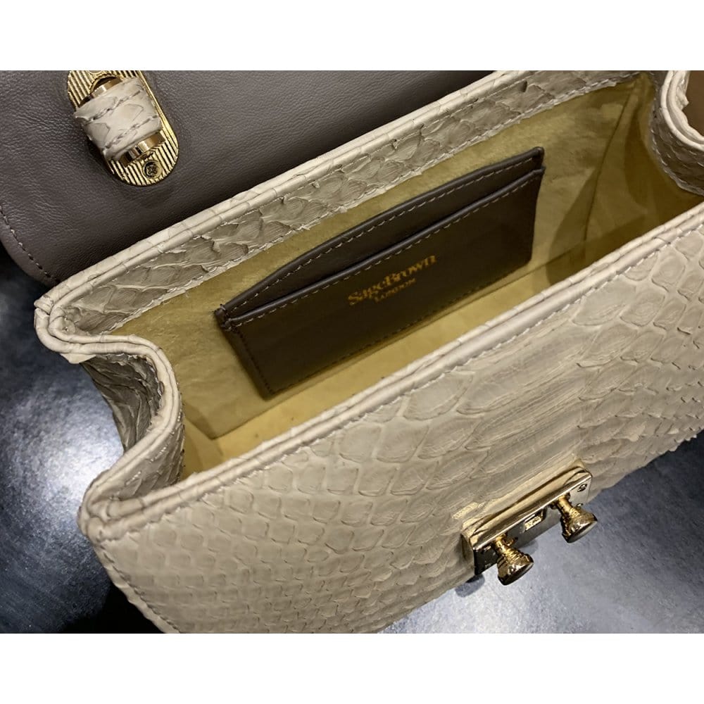 Small real python top handle bag, ivory, inside