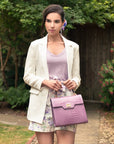 Leather signature Morgan bag, lilac croc, lifestyle