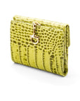 Leather purse with brass clasp, lime green croc, front view