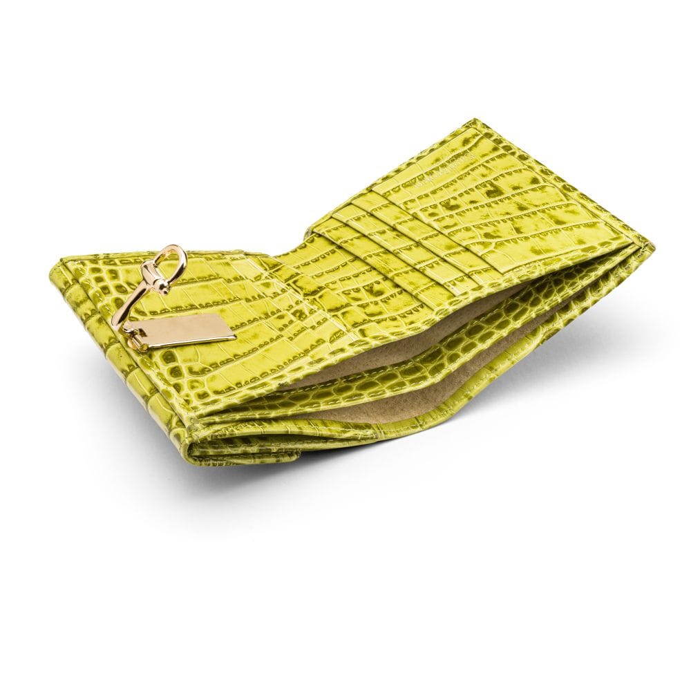 Leather purse with brass clasp, lime green croc, inside