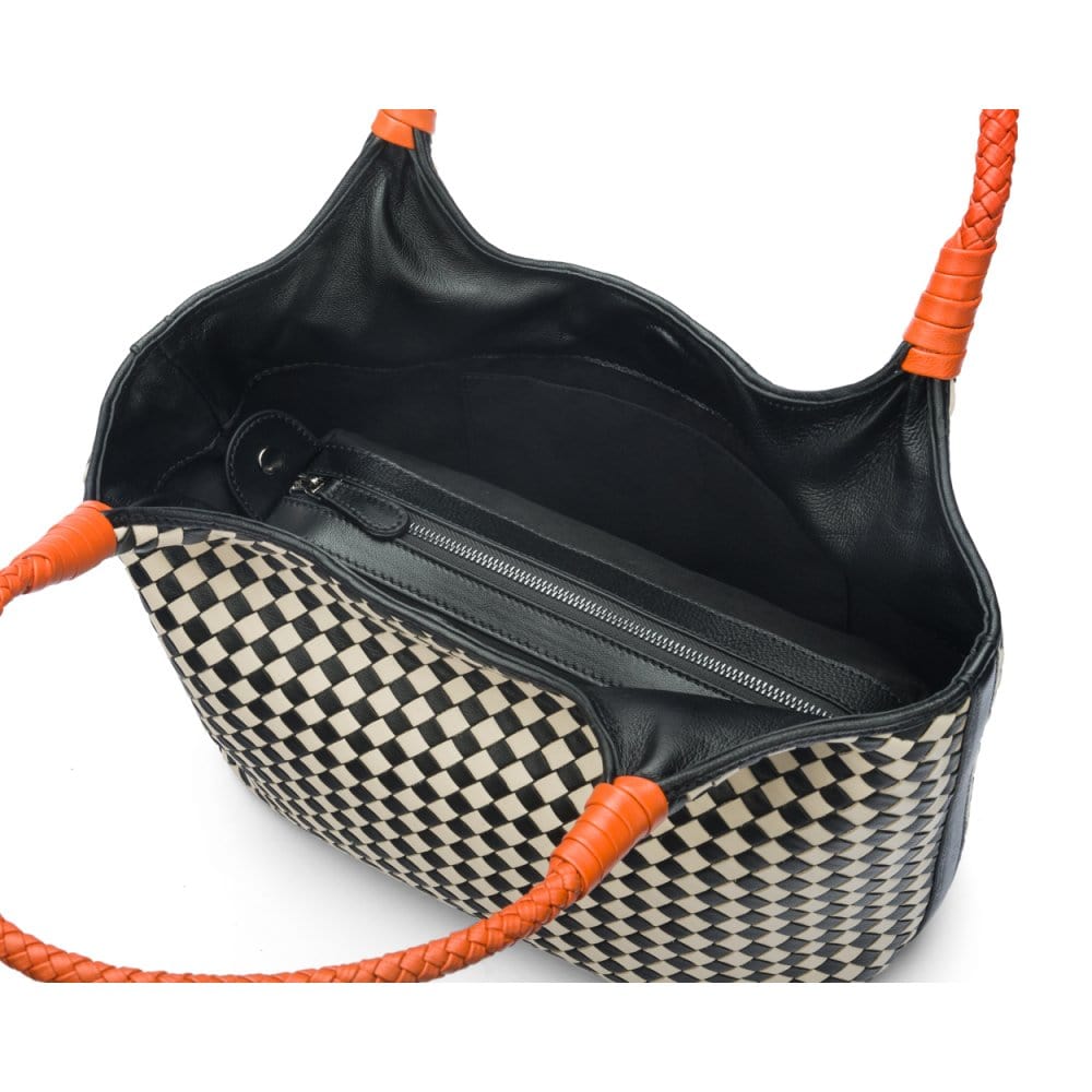 Woven leather shoulder bag, black and ecru check with orange handles, inside