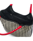 Woven leather shoulder bag, black and ecru check with red handles, open