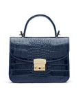 Small leather top handle bag, navy croc, front