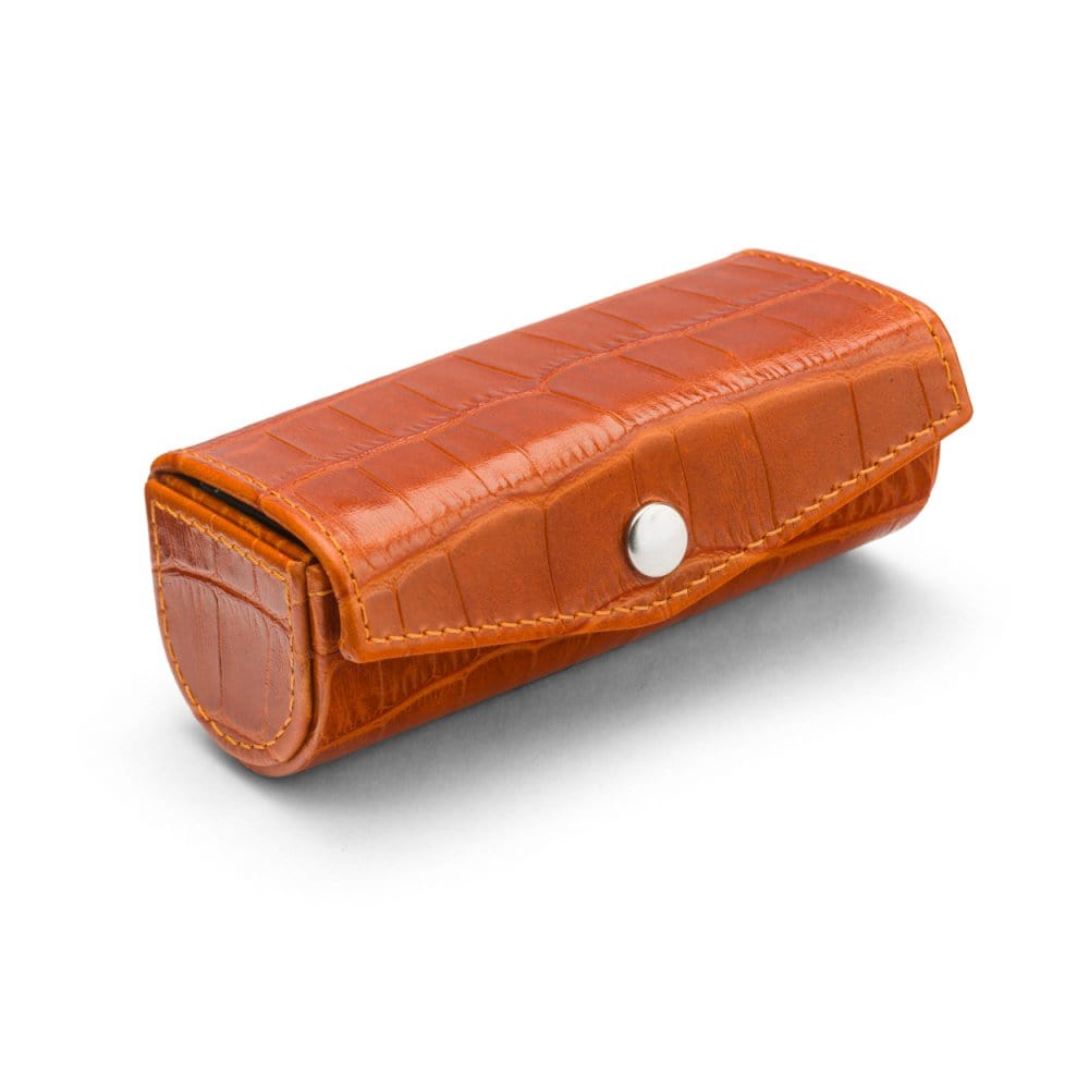 Leather lipstick case. orange croc, top