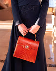Leather signature Morgan bag, orange croc, lifestyle