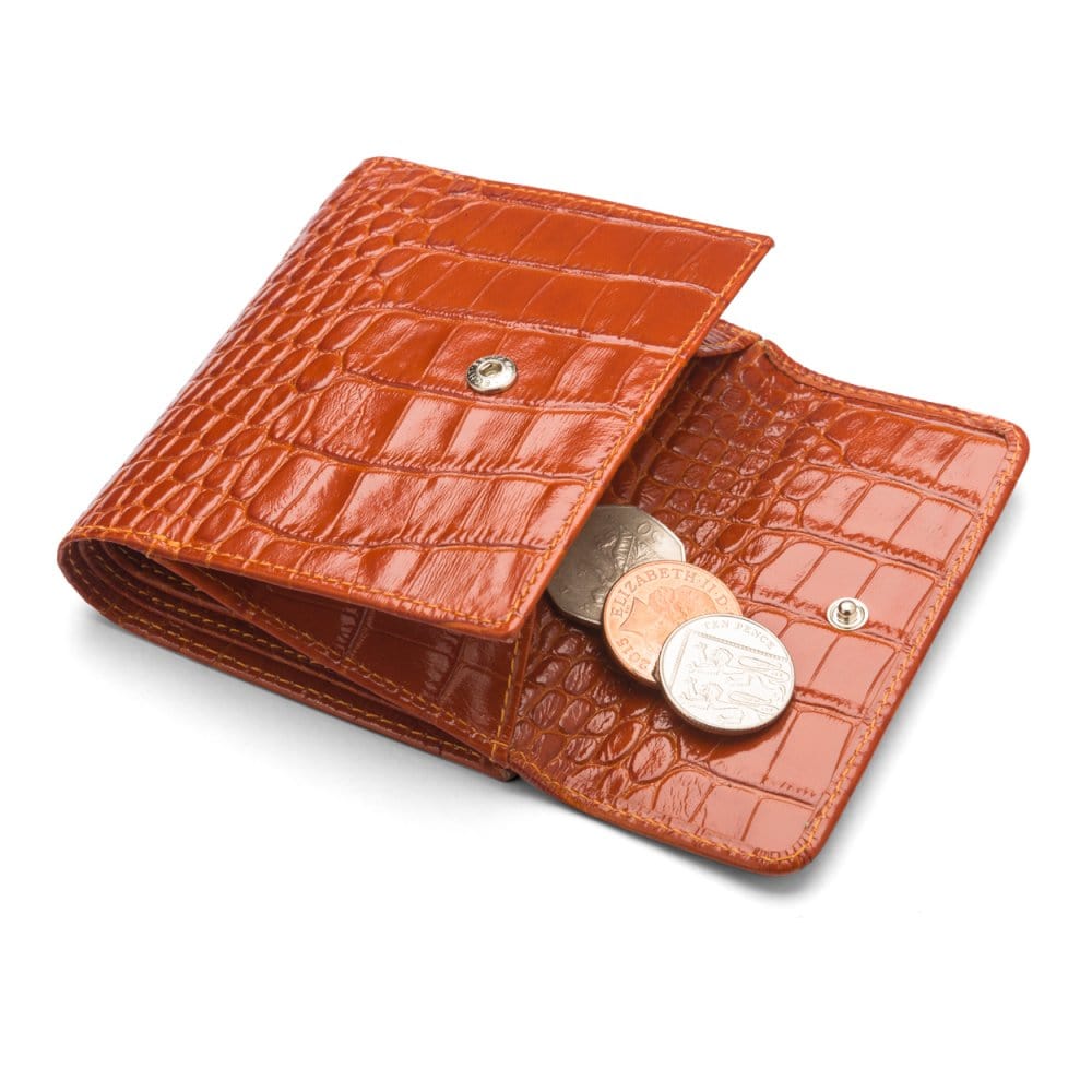 Leather purse with brass clasp, orange croc, open