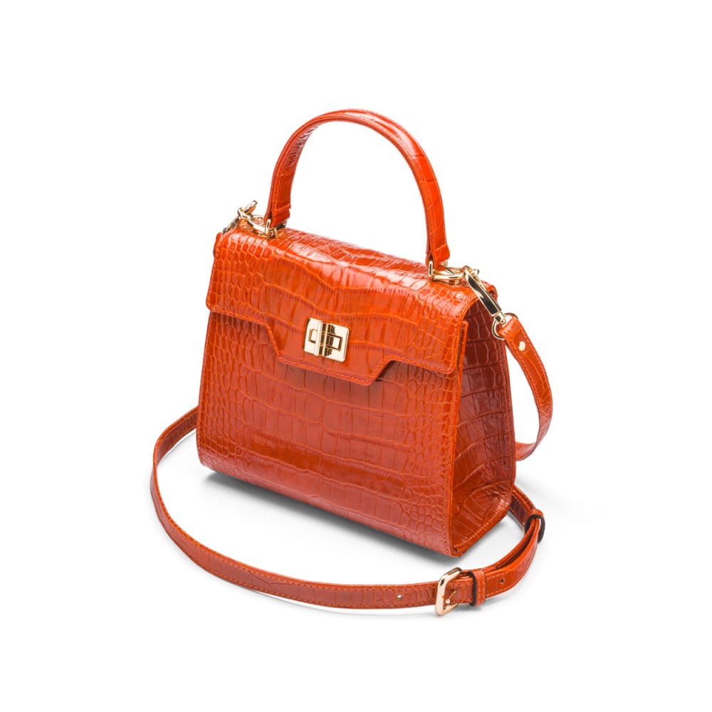 Mini leather Morgan Bag, top handle bag, orange croc, side view