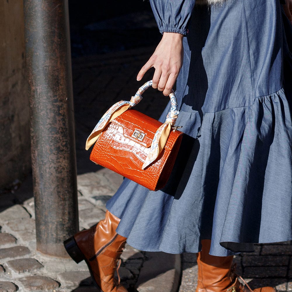Mini leather Morgan Bag, top handle bag, orange croc, lifestyle
