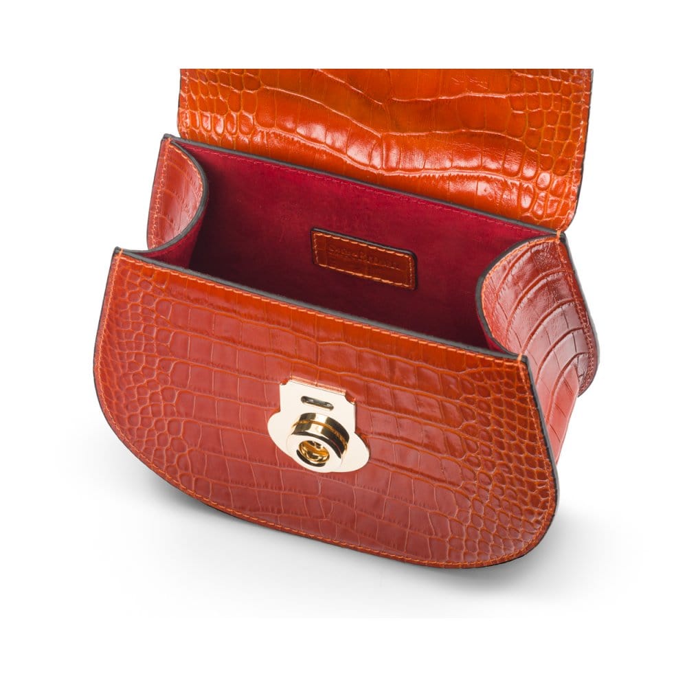 Leather rounded bottom top handle bag, orange croc, inside