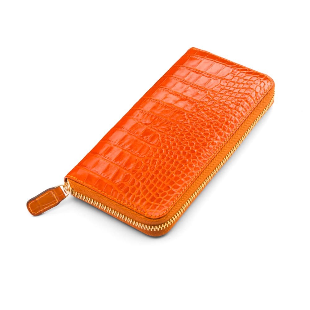 Tall leather zip around accordion purse, orange croc, front