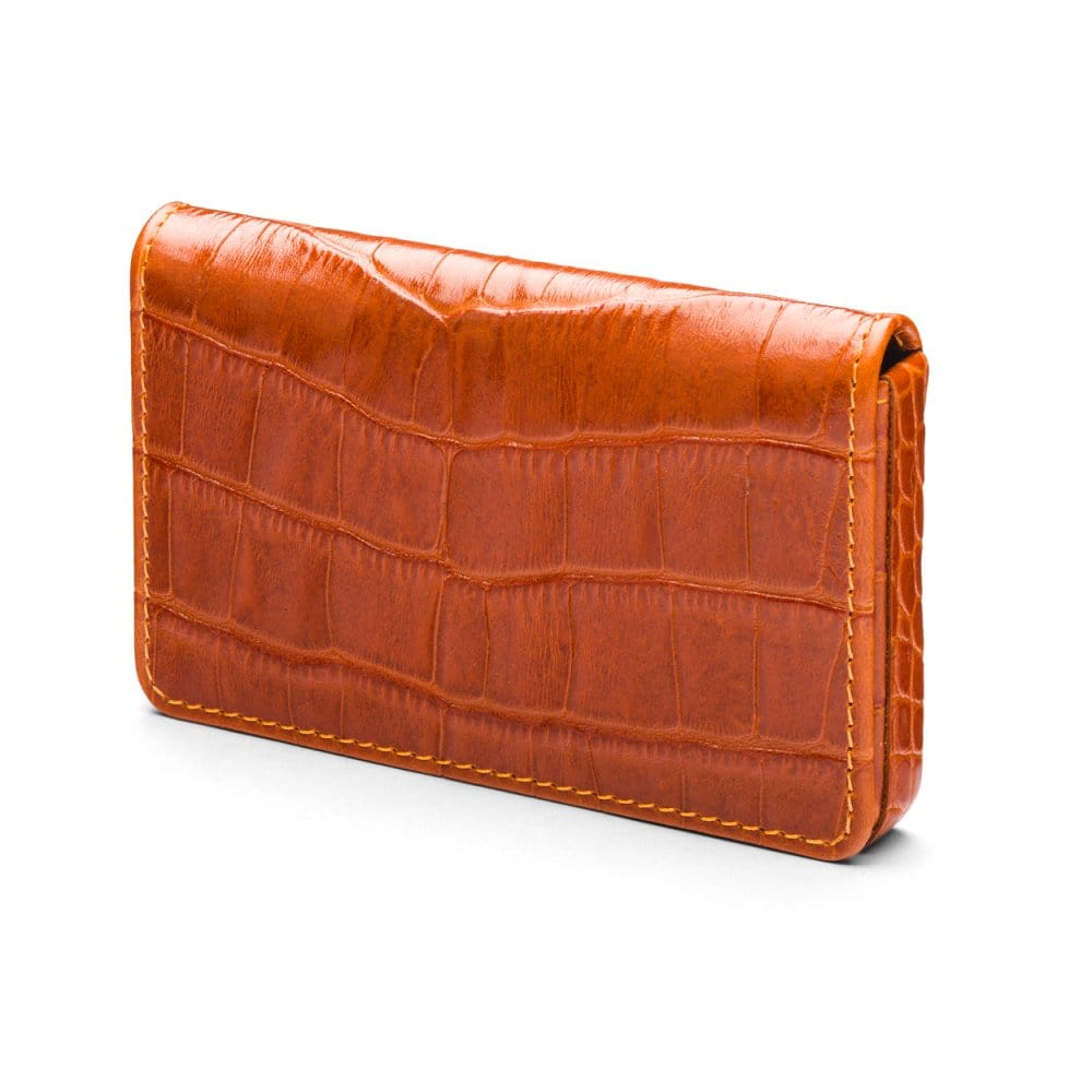 Leather business card holder with magnetic closure, orange croc, front