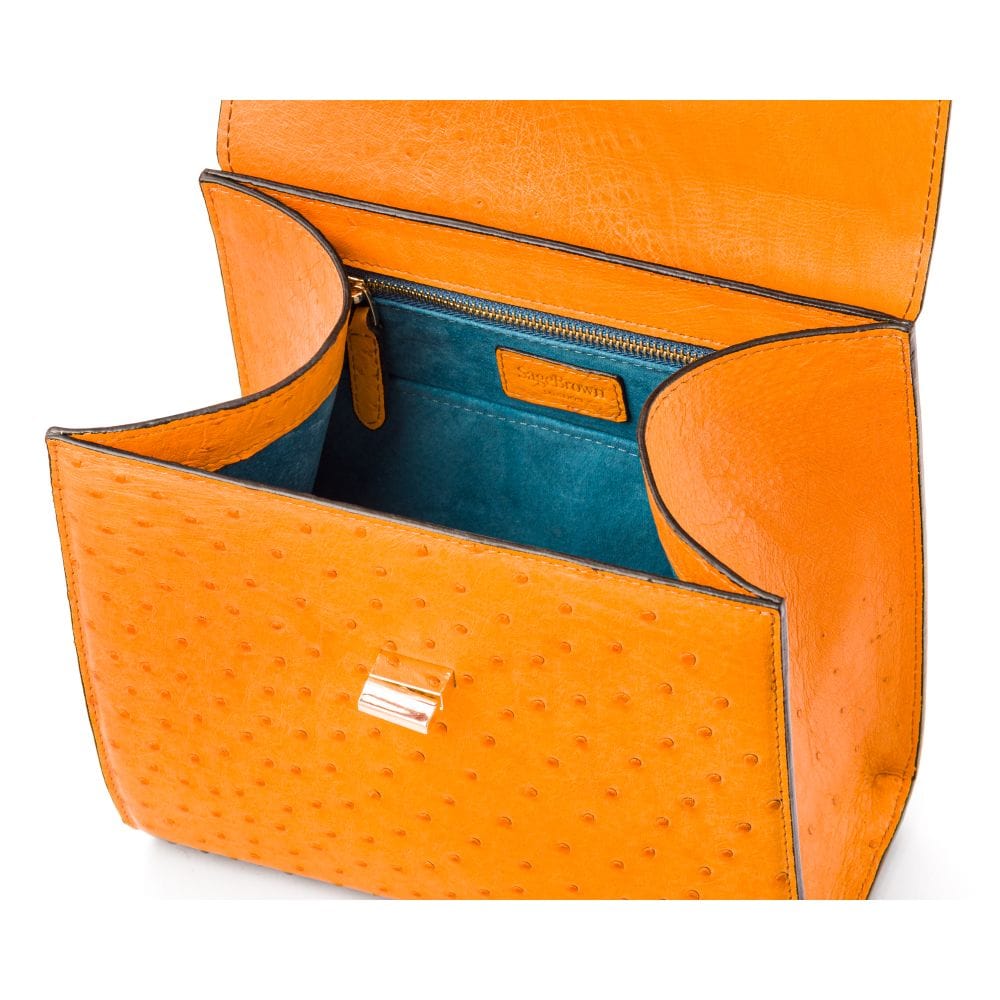 Real ostrich top handle bag, orange, inside view