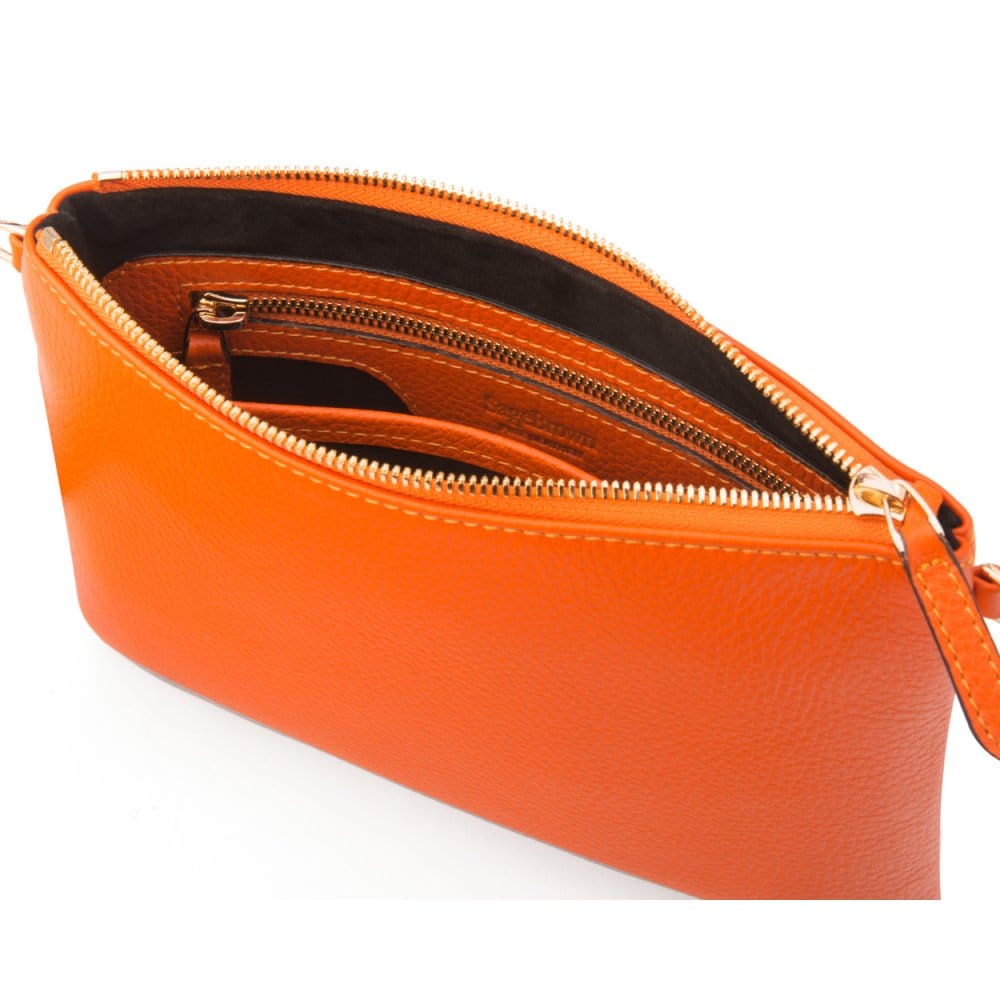 Leather cross body bag with chain strap, orange, inside