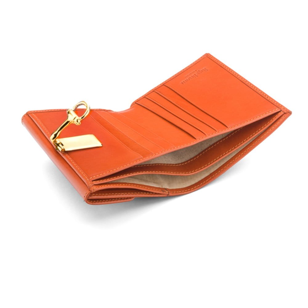 Leather purse with brass clasp, orange, inside
