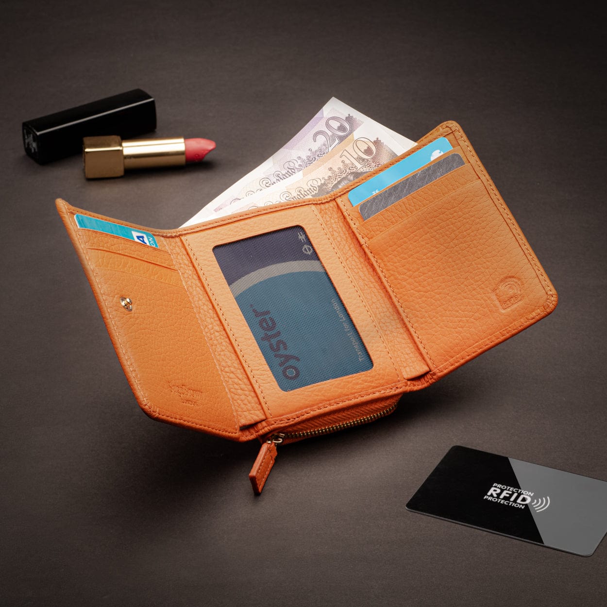 RFID blocking leather tri-fold purse, orange, lifestyle