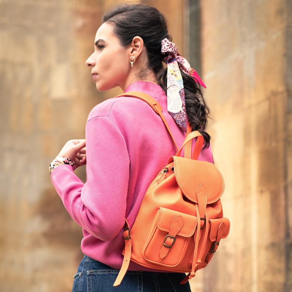 Small leather backpack, orange , lifestyle