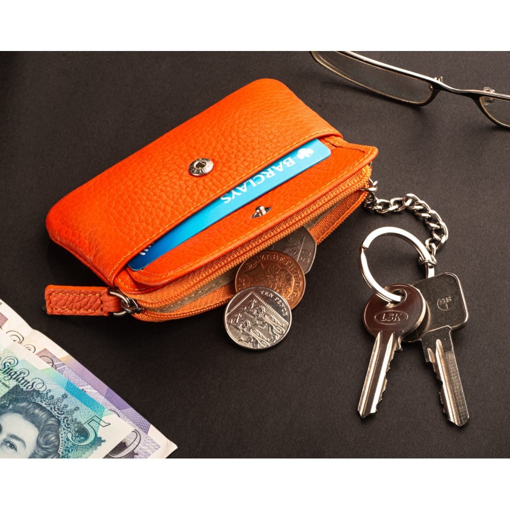 Small leather zip coin purse, orange, lifestyle