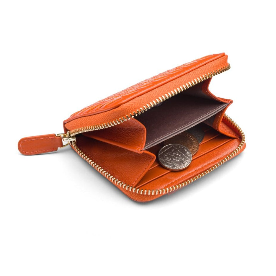 Small zip around woven leather accordion purse, orange, inside