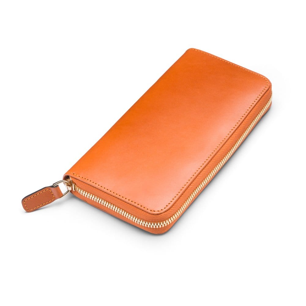 Tall leather zip around accordion purse, orange, front