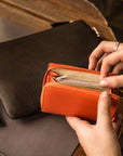 RFID blocking leather tri-fold purse, orange, lifestyle