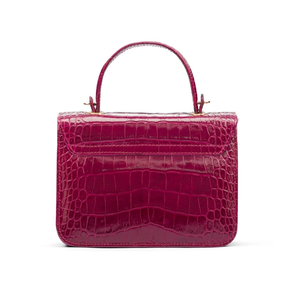 Small leather top handle bag, pink croc, back