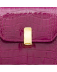 Leather top handle bag, pink croc, lock closeup