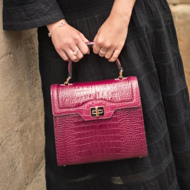 Leather signature Morgan bag, pink croc, lifestyle view