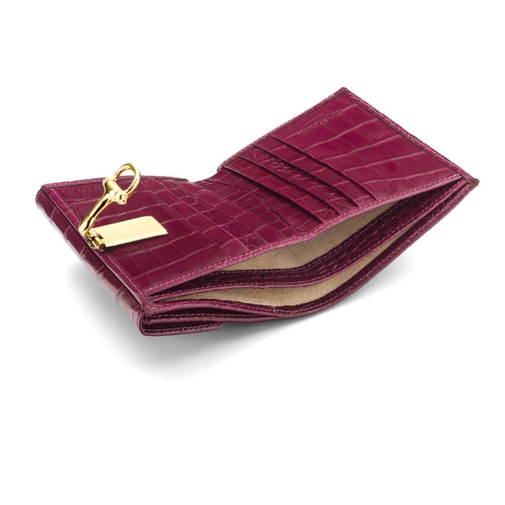 Leather purse with brass clasp, pink croc, inside