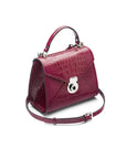 Mini Burnett small top handle bag, pink croc, side view