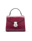 Mini Burnett small top handle bag, pink croc, front view