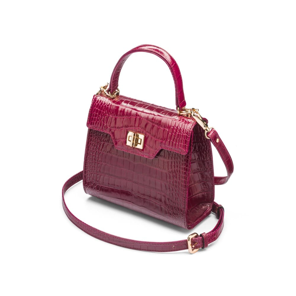 Mini leather Morgan Bag, top handle bag, pink croc, side view