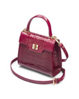 Mini leather Morgan Bag, top handle bag, pink croc, side view