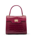 Mini leather Morgan Bag, top handle bag, pink croc, front view