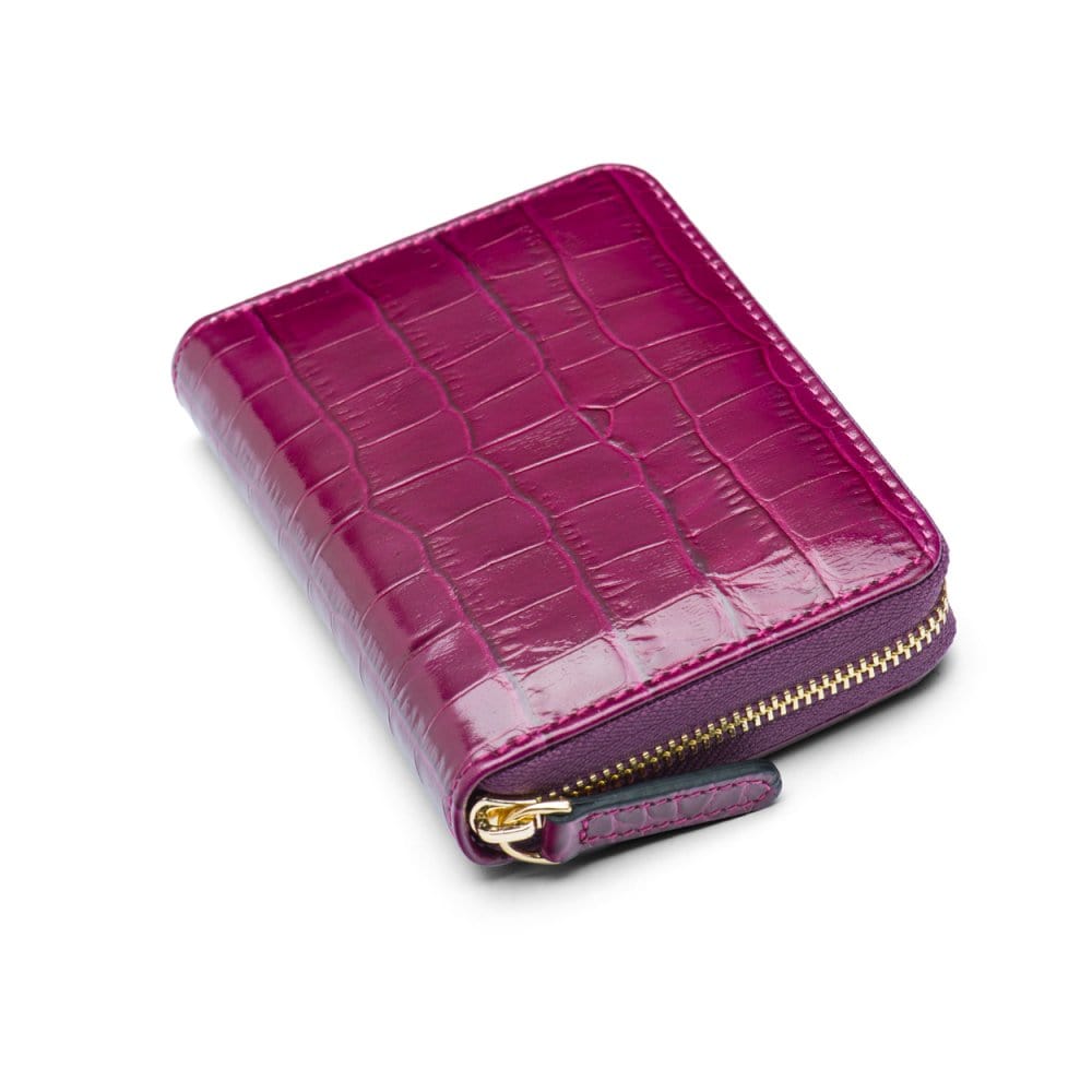 Small leather zip around accordion coin purse, pink croc, front