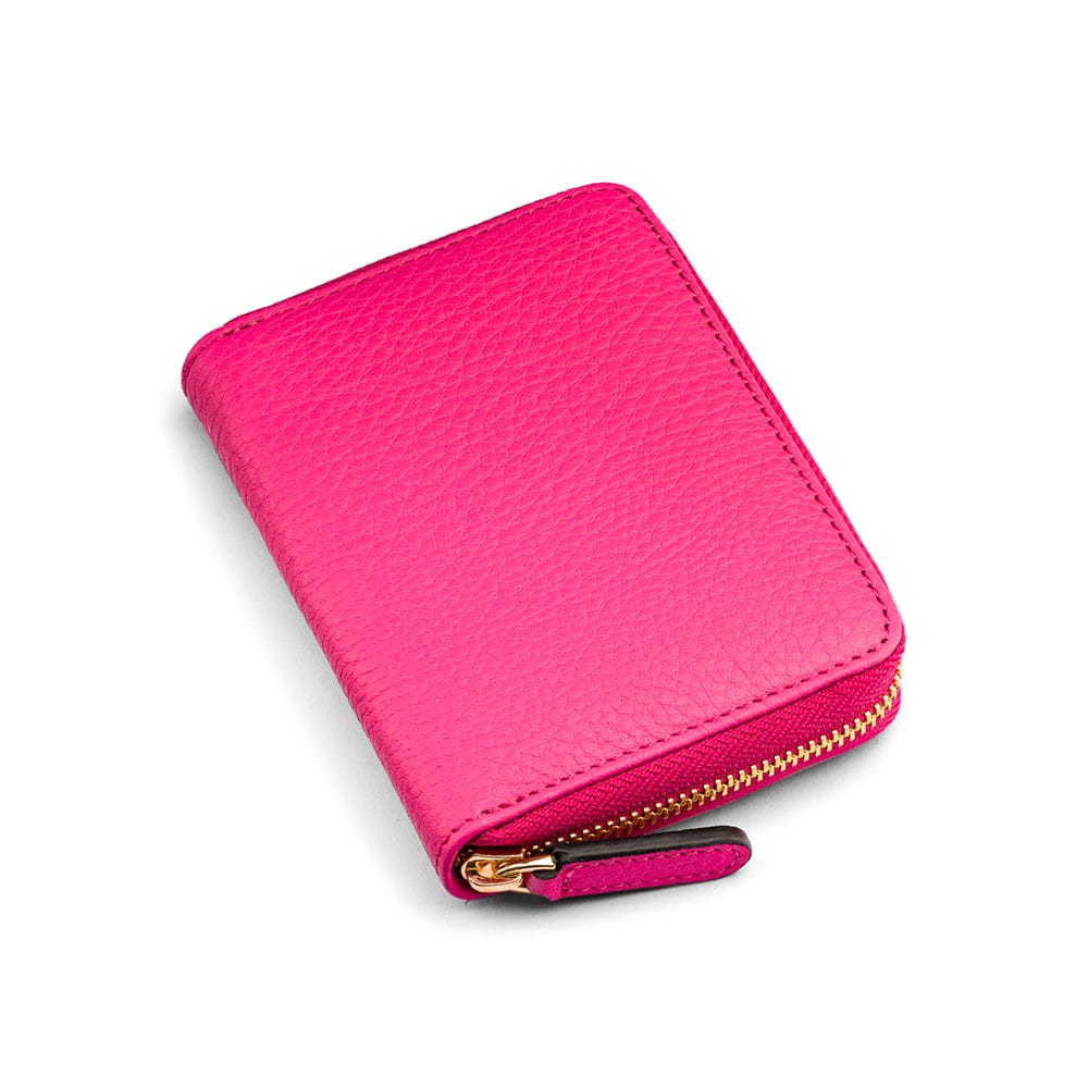 small zip around purse, pink, front view