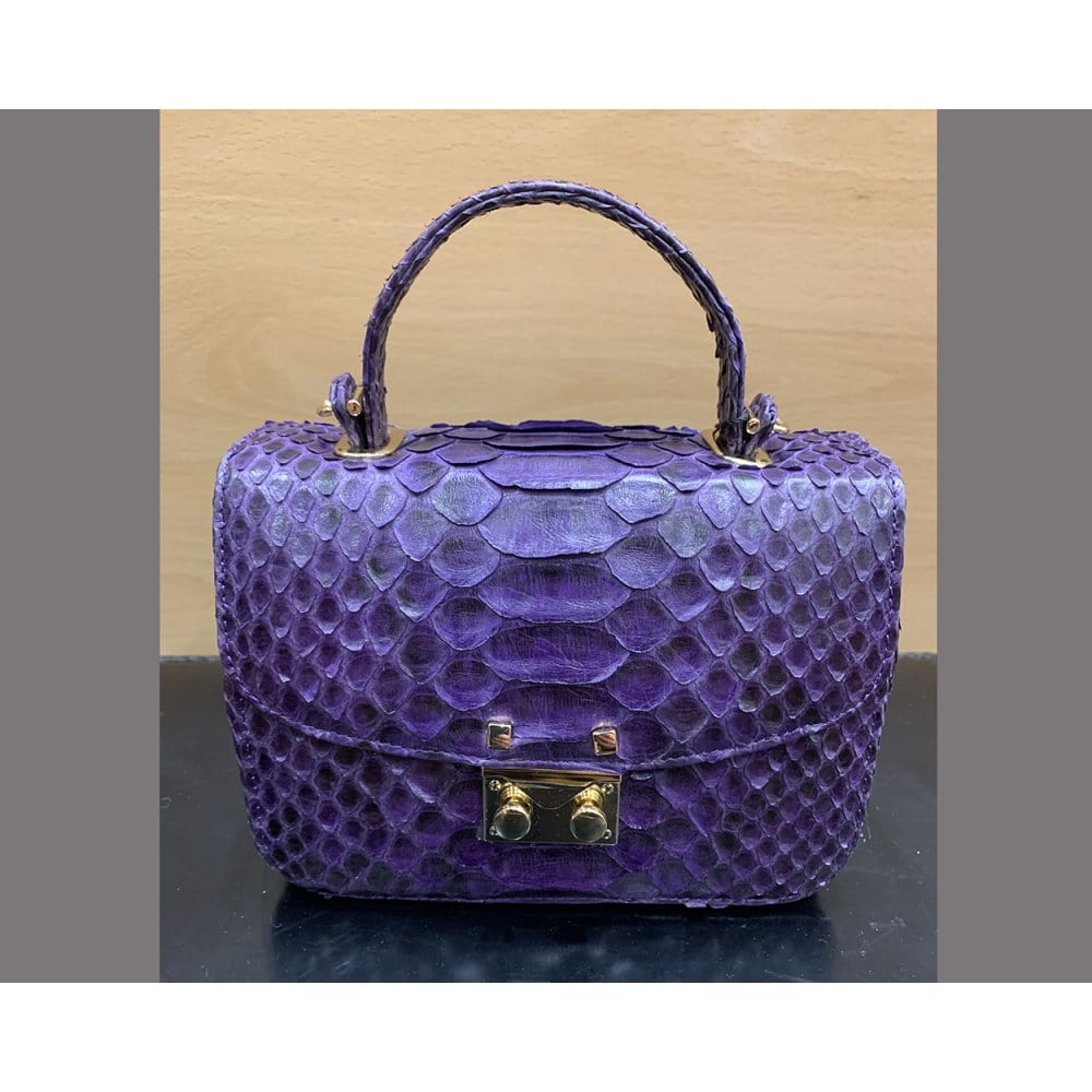 Small real python top handle bag, purple, front