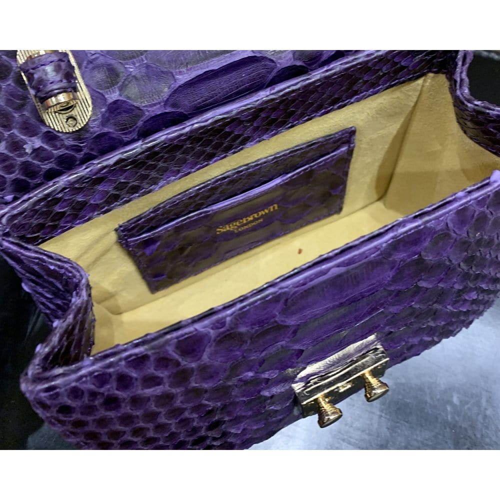 Small real python top handle bag, purple, inside