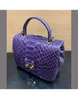 Small real python top handle bag, purple, side