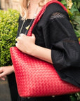 Woven leather shoulder bag, red, lifestyle