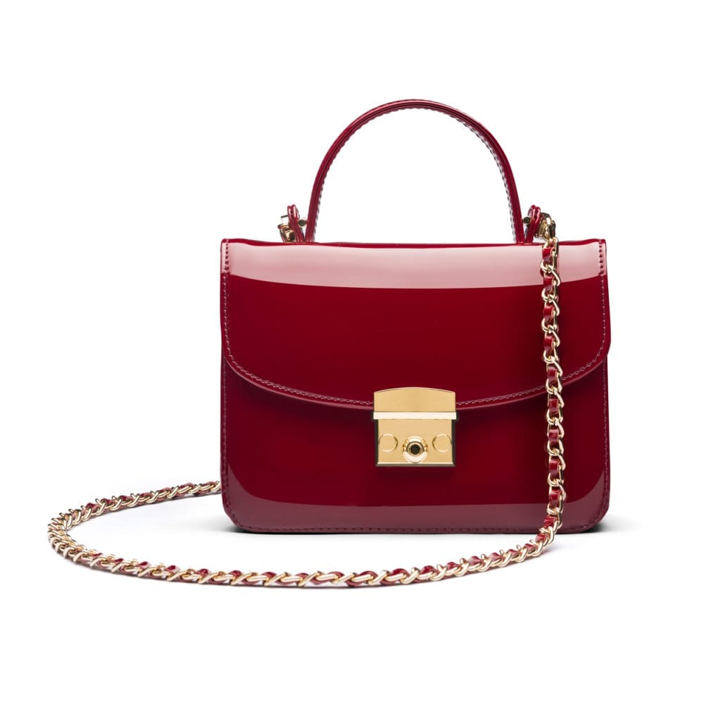 Small leather top handle bag, red patent, with chain strap